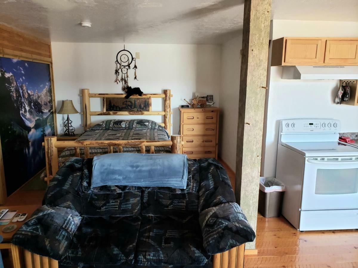 Wolf Den Log Cabin Motel And Rv Park Thayne Екстер'єр фото